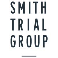 Smith Trial Group White Logo