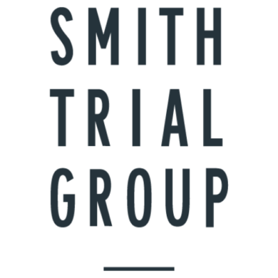 cropped-STG_Logo-Stacked_blue.png Smith Trial Group White Logo