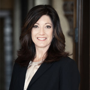 Jennifer Smith Headshot in Business Suit