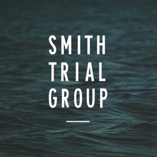 Smith Trial Group Logo with dark Water in the Background