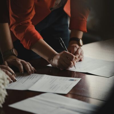 AB 250 revived sexual assault claims in California Person writing on paper - AB 250 revived sexual assault claims in California