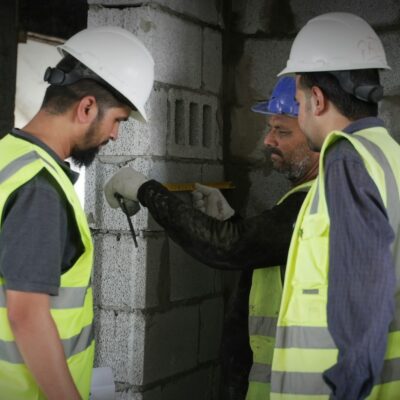 Construction workers in safety vests - Cal/OSHA complaint retaliation Construction workers in safety vests - Cal/OSHA complaint retaliation