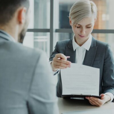 Professionals reviewing a document - cease-and-desist letter to employee Professionals reviewing a document - cease-and-desist letter to employee