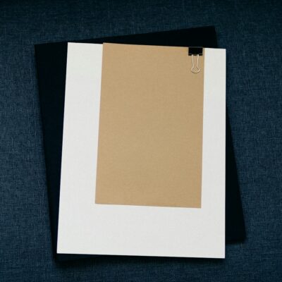 Clipboard on a dark surface Clipboard on a dark surface