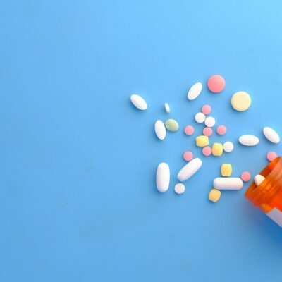 Pills spilling from a prescription bottle - dangerous drug and medical device claims