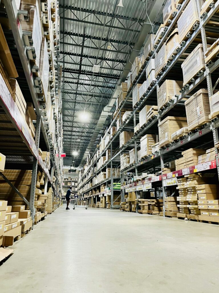 Warehouse aisle representing a California workplace layoff