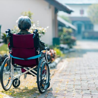 Woman in a wheelchair - limb loss injury compensation