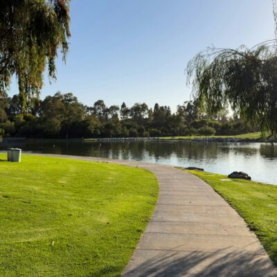 Park path beside office campus - Orange County executive severance negotiation